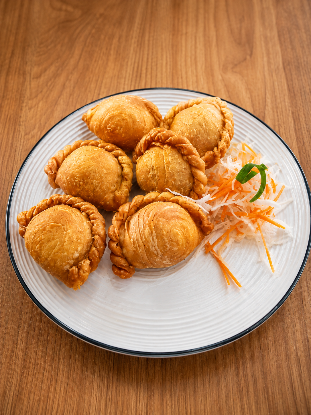 Golden curry puffs with shredded vegetables